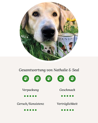Ein Bild von Seal bei welchem er einen Kopf auf einer DOG'S LOVE Dose abgelegt hat